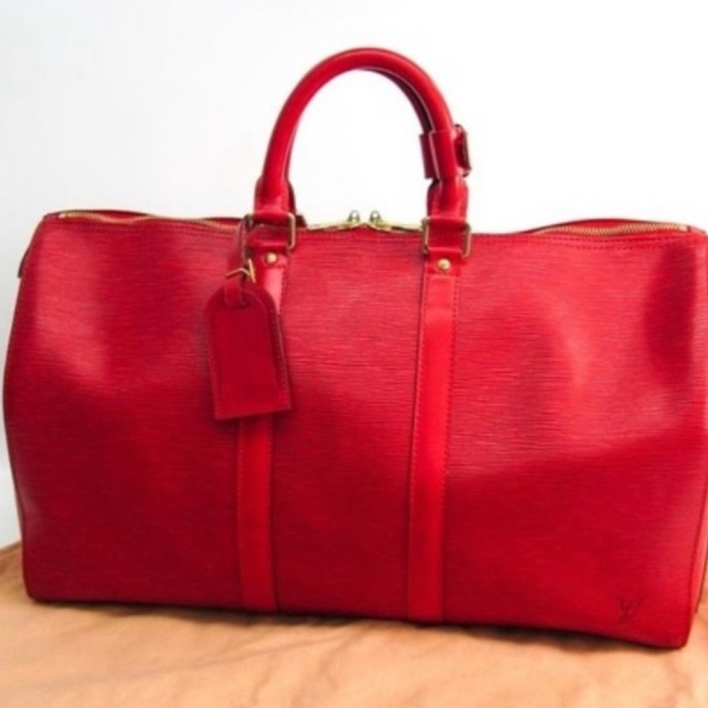 Red Spacious Louis Vuitton Epi Duffel Bag with Gold Hardware